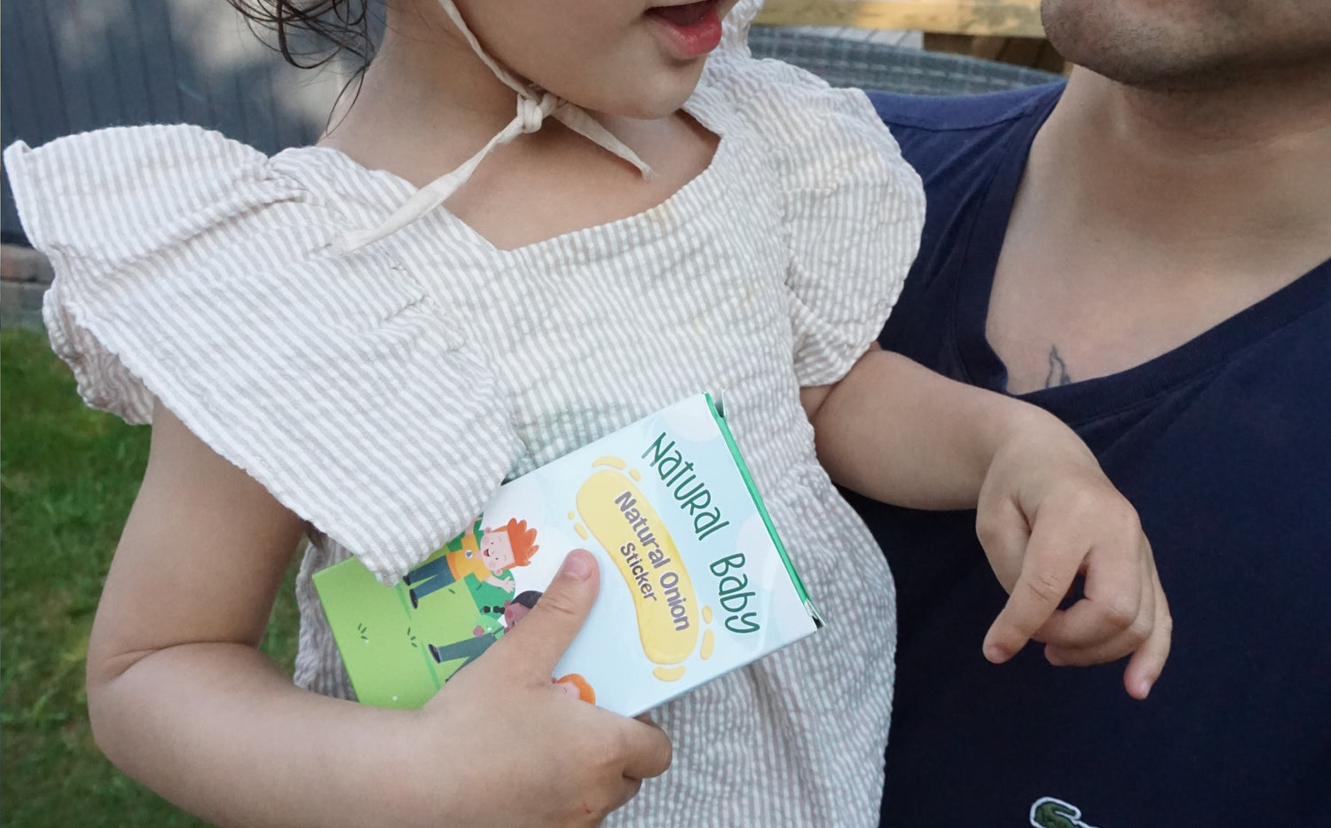 Kid with onion sticker